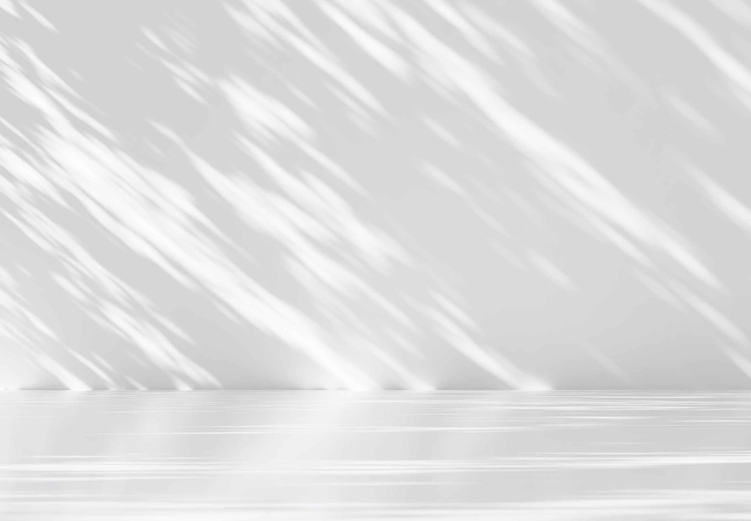 Soft shadows on a minimalist white background.