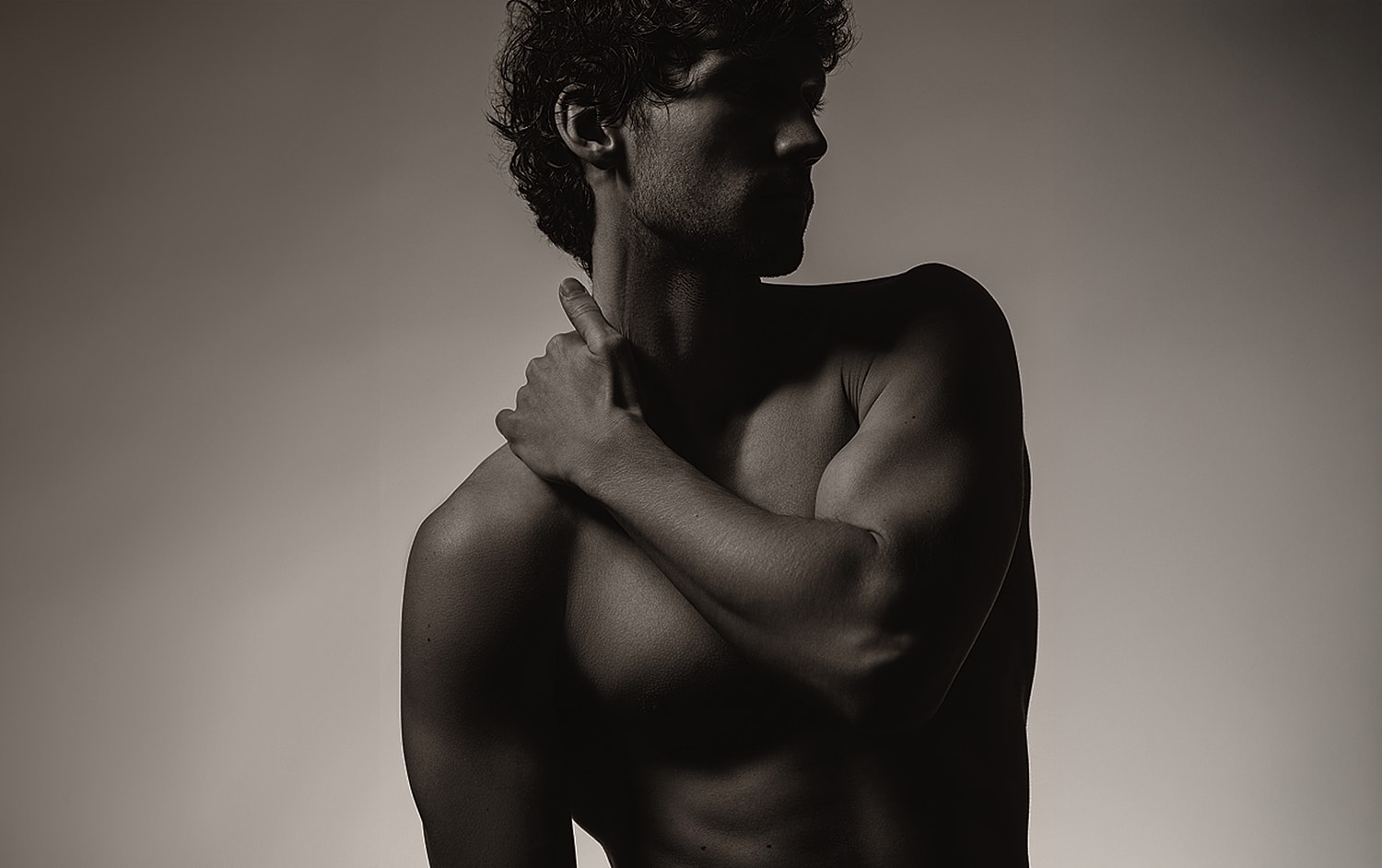 Silhouette of a man with artistic lighting.