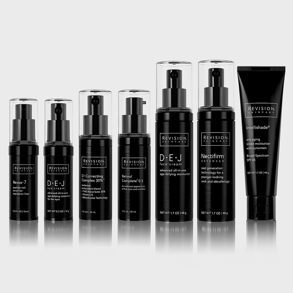 Revision Skincare products in sleek black packaging.