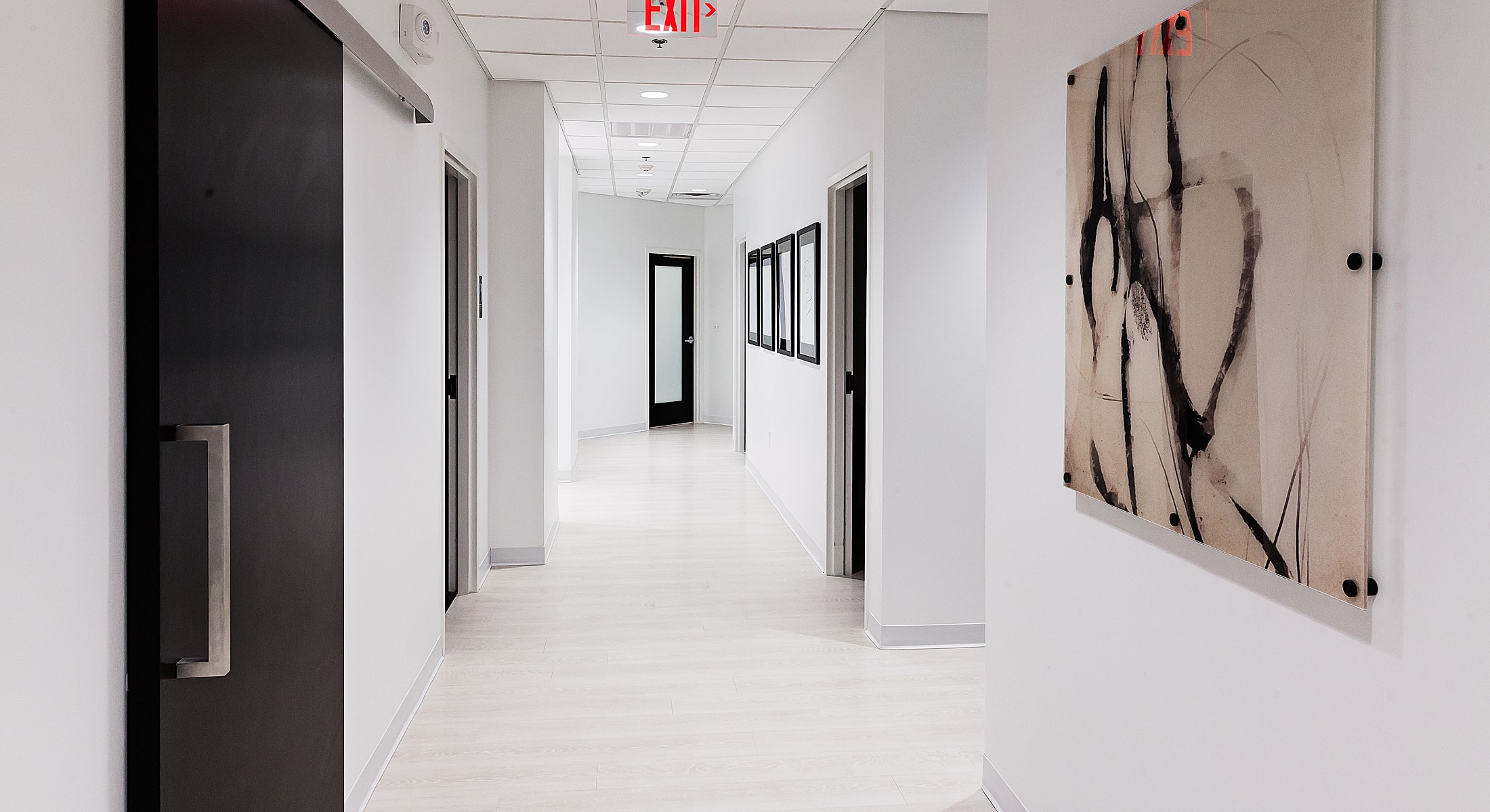 Modern hallway with artwork on the wall
